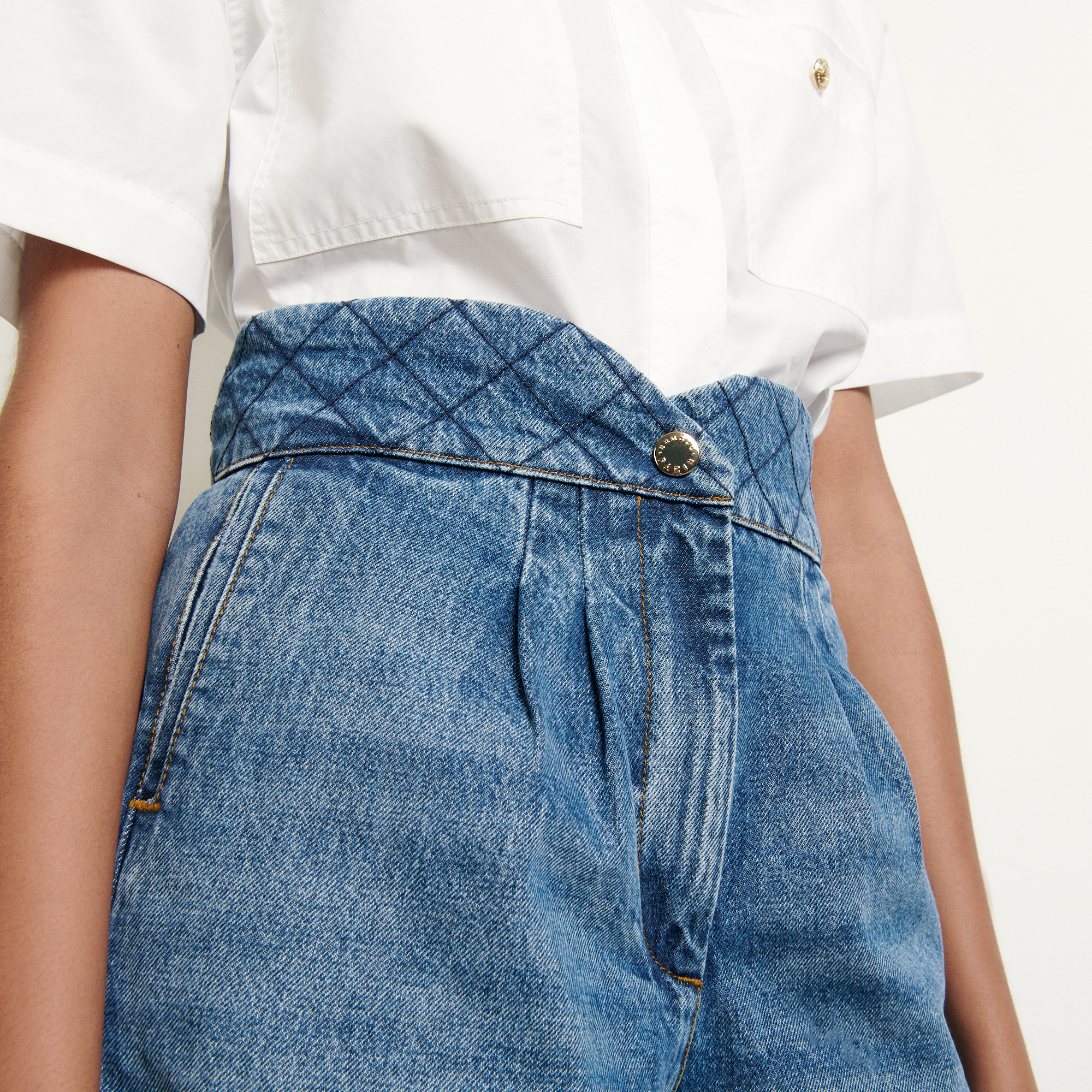 jean shorts with pockets showing